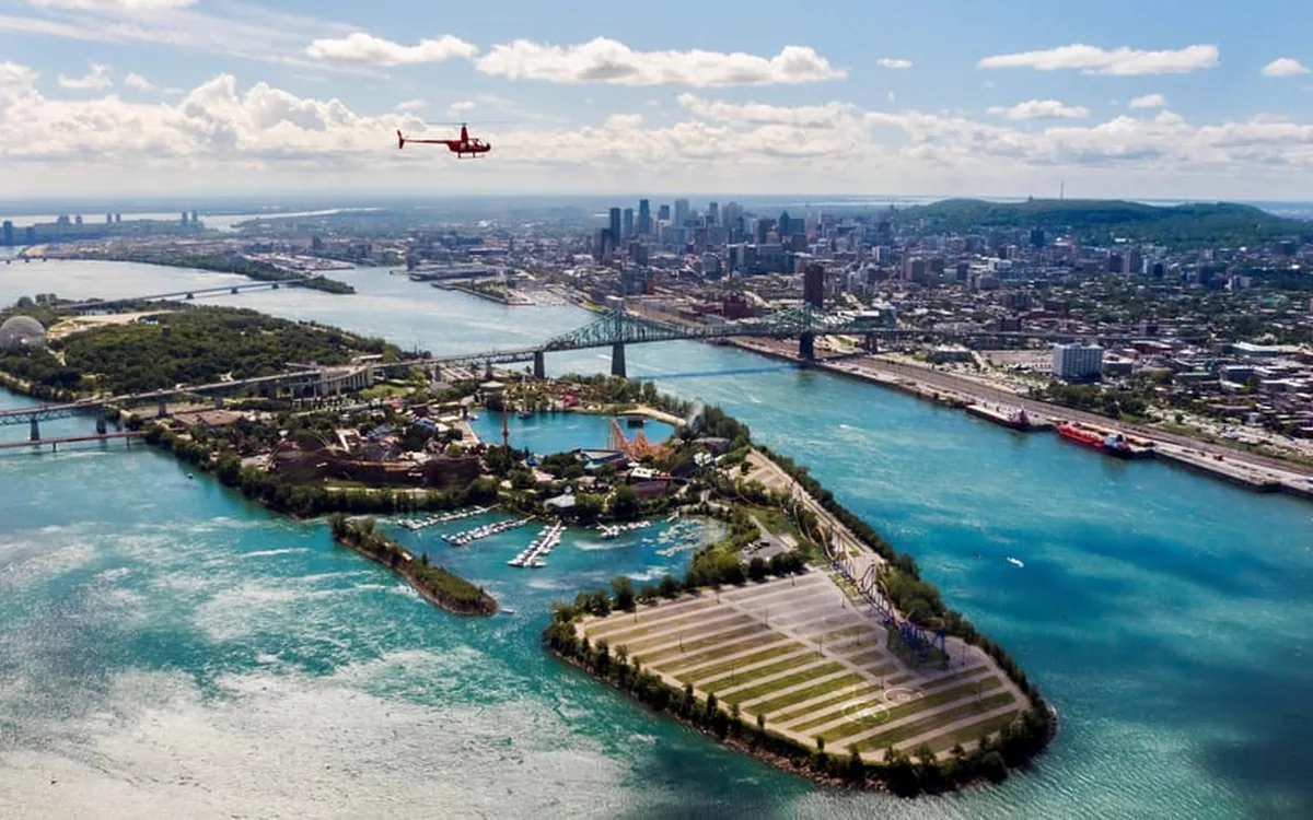 A helicopter over the Montreal skyline near the St Lawrence River